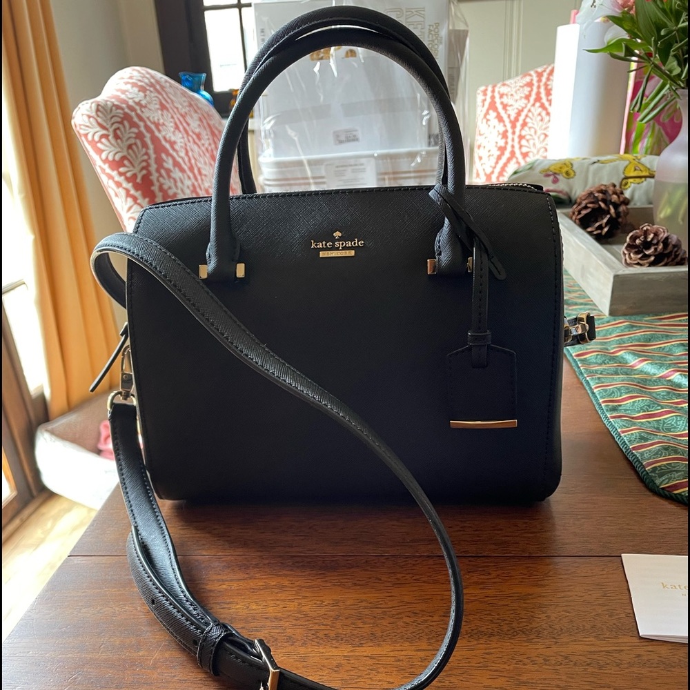 Kate Spade NWOT never used small black crossbody satchel.